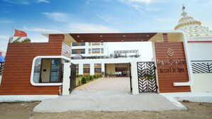 A resort entrance with a modern design, a large gate, and a sign indicating the name "Shanti Seaview Resort & Spa". - Shanti seaview resort and spa (Kanthi)