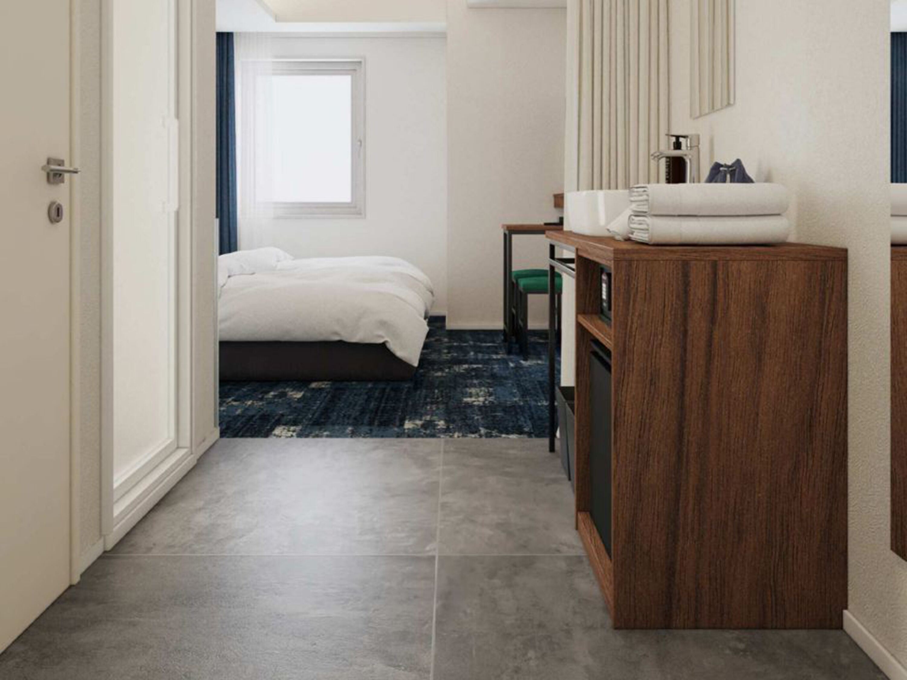 A bedroom with a bed, a desk, a chair, a dresser, and a window.