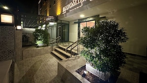 A hotel entrance with a sign reading "BLOOMTALYA" and a staircase leading to the lobby. - Bloomtalya Hotel  (Antalya)