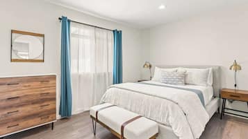 1 bedroom, desk, iron/ironing board, travel crib