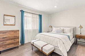 1 bedroom, desk, iron/ironing board, travel cot