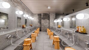 A public restroom with multiple sinks, mirrors, and wooden stools. - RYOKAN GINKAKU KYOTO (Kyoto)