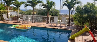 Le Bellier, studio vue mer avec piscine au sel, jardin arboré au calme