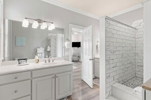 Bathtub, hair dryer, towels