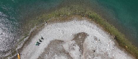 On the beach, sun-loungers, beach towels