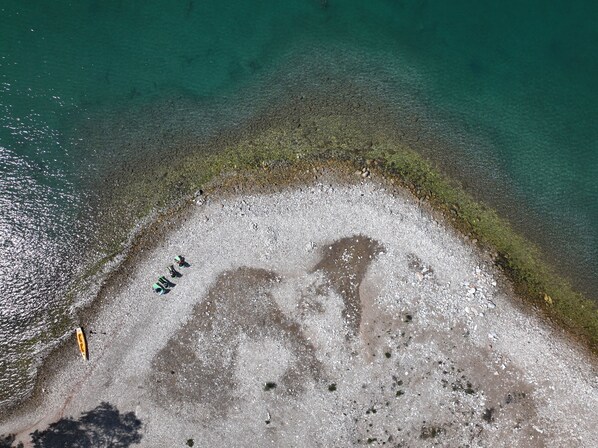 On the beach, sun-loungers, beach towels