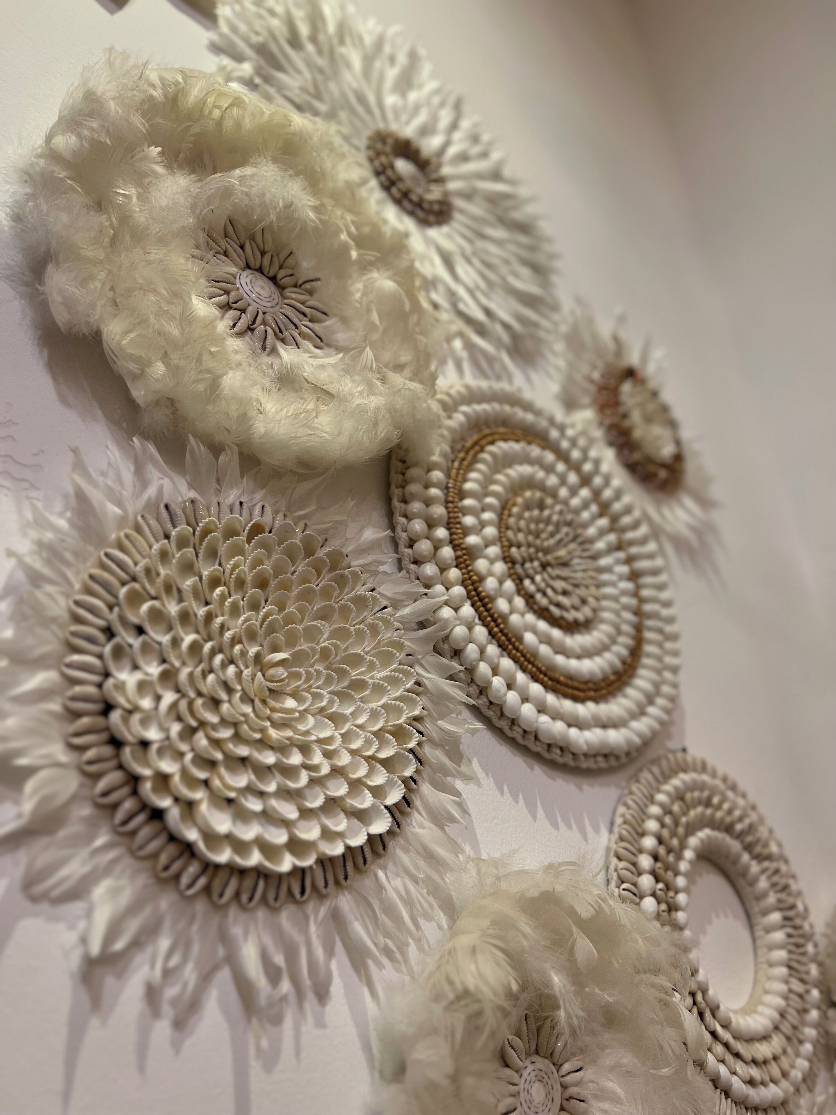 A close-up of decorative wall art featuring intricate patterns and textures.