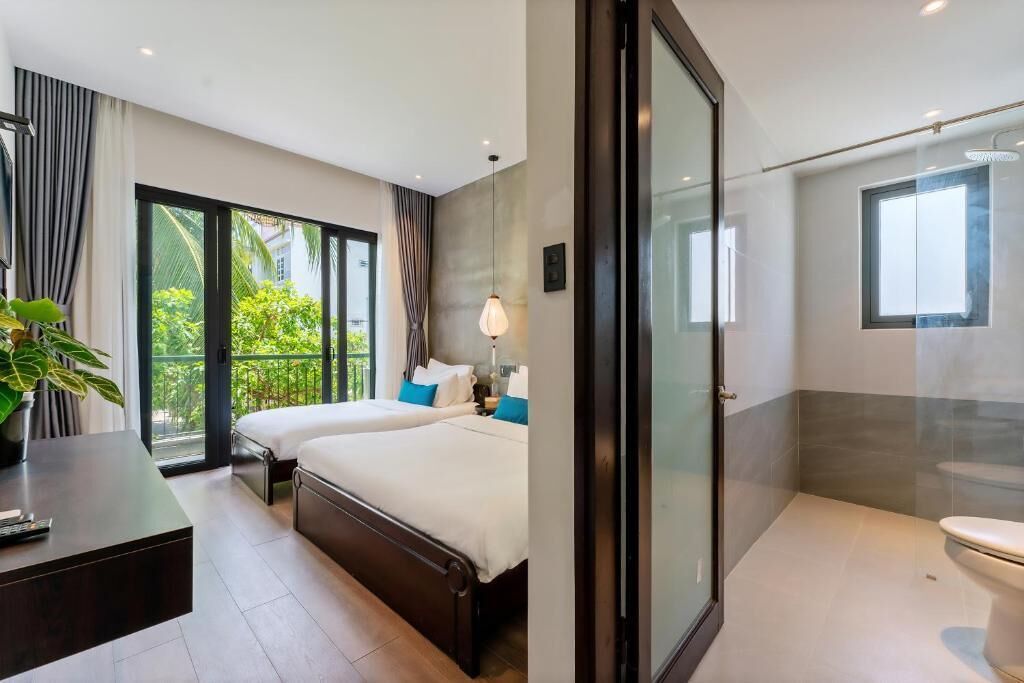 Deluxe Triple Room, Garden View | Minibar, desk, soundproofing, free WiFi