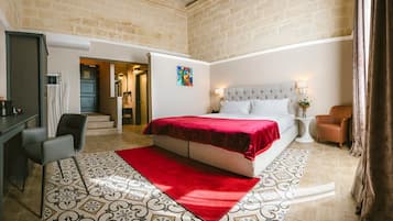Deluxe Suite | 1 bedroom, down comforters, minibar, in-room safe