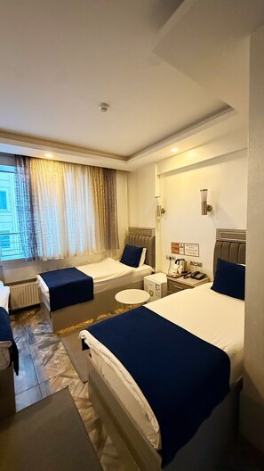 Basic Triple Room | Premium bedding, in-room safe, free WiFi, bed sheets - Hotel Kurban (Istanbul)