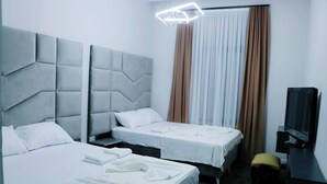 Classic Quadruple Room, 2 Queen Beds | Premium bedding, down comforters, minibar, desk - Taksim Ninova Hotel (Istanbul)