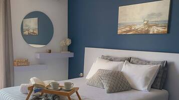 2 habitaciones, tabla de planchar con plancha, wifi y ropa de cama