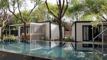 Seasonal outdoor pool, pool umbrellas, sun loungers