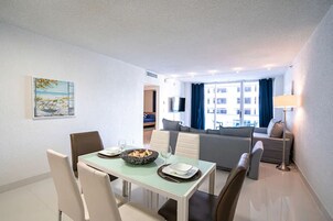 Family Apartment | Living area | 32-inch flat-screen TV with cable channels