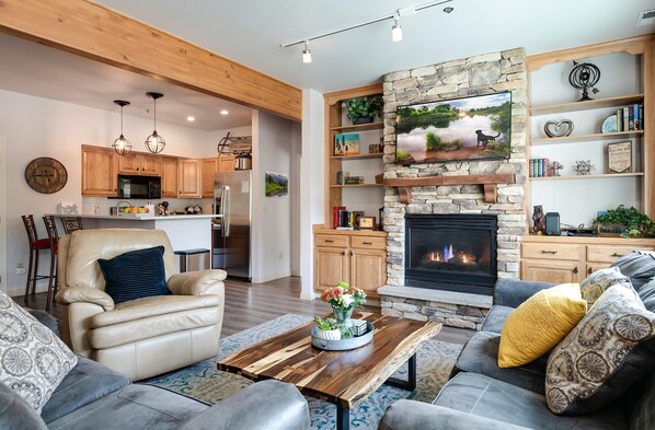 TV, fireplace, books - Fourth & Main Condo: Heart of Frisco (Frisco)