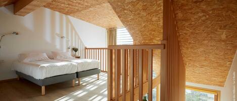 Premium bedding, individually furnished, laptop workspace