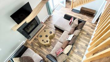 Smart TV, fireplace, foosball