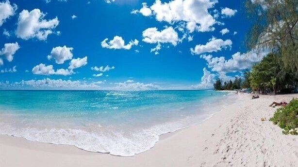 A beach with clear blue water, white sand, and scattered clouds. - Bella Figura by BSL Rentals (Rockley)