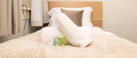 2 slaapkamers, een strijkplank/strijkijzer, reisbedje, gratis wifi