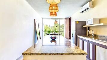 Fridge, microwave, stovetop, coffee/tea maker