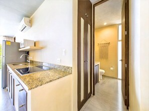 Fridge, microwave, stovetop, coffee/tea maker