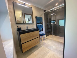 Shower, towels, toilet paper