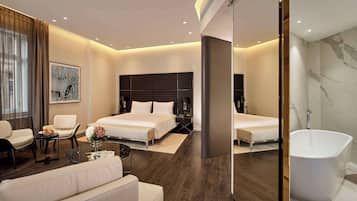 Junior Suite | 1 bedroom, in-room safe, desk, laptop workspace