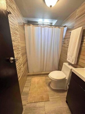Hair dryer, towels, soap, toilet paper