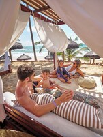 On the beach, free beach shuttle, beach bar