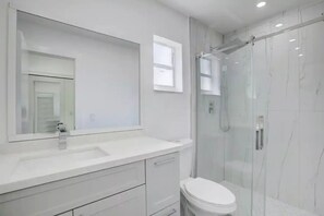 Shower, towels, soap, shampoo