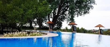 Outdoor pool, pool umbrellas, sun loungers