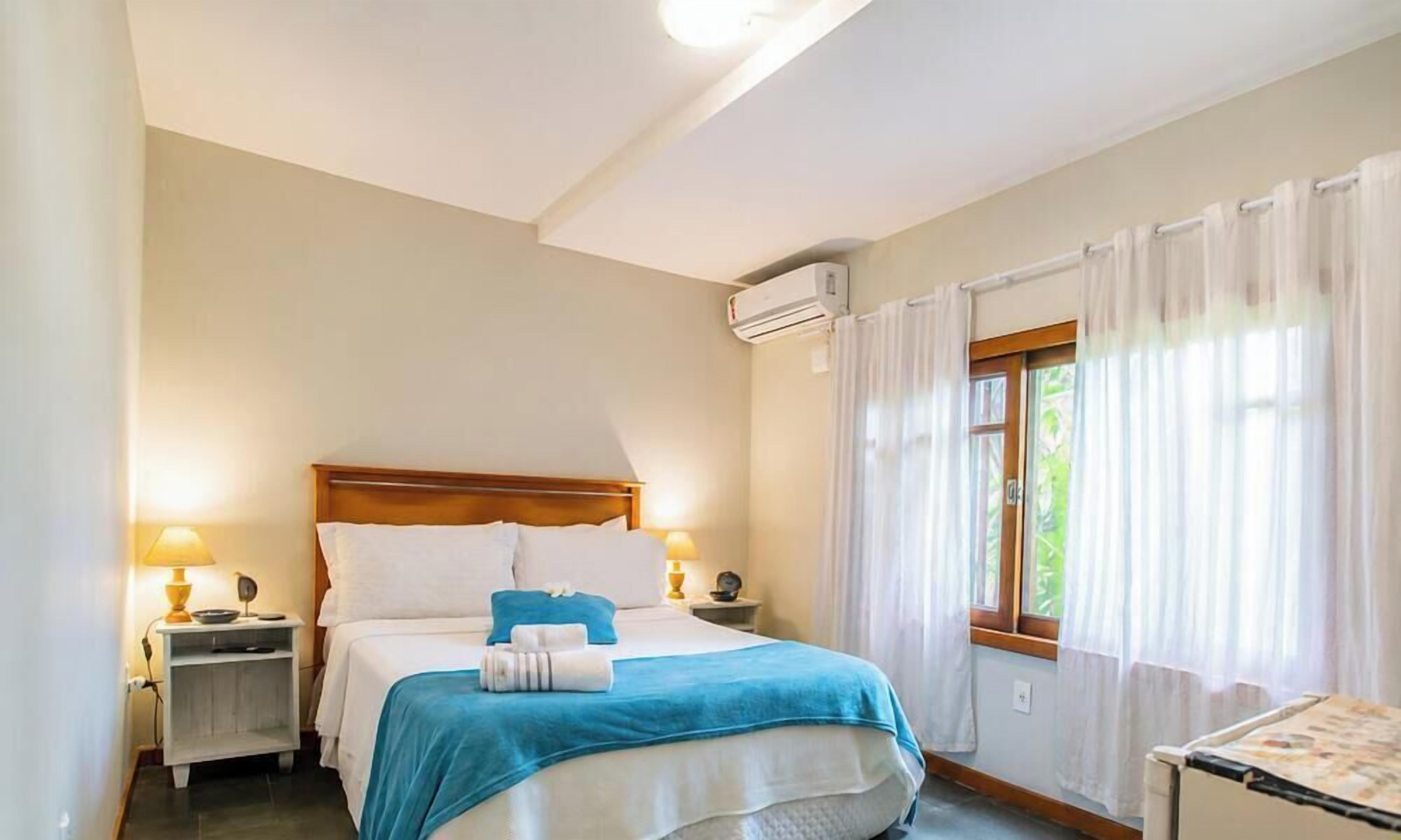 S5 - Suíte Ribeirão da Ilha - Bollte Praia Boutique Pousada - Campeche | Sábanas de algodón egipcio, ropa de cama de alta calidad y minibar 