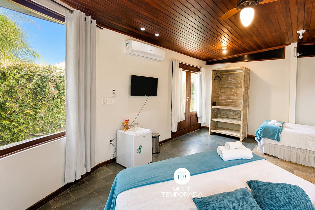 S3 - Suíte Lagoinha do Leste - Bollte Praia Boutique Pousada - Campeche | Sábanas de algodón egipcio, ropa de cama de alta calidad y minibar