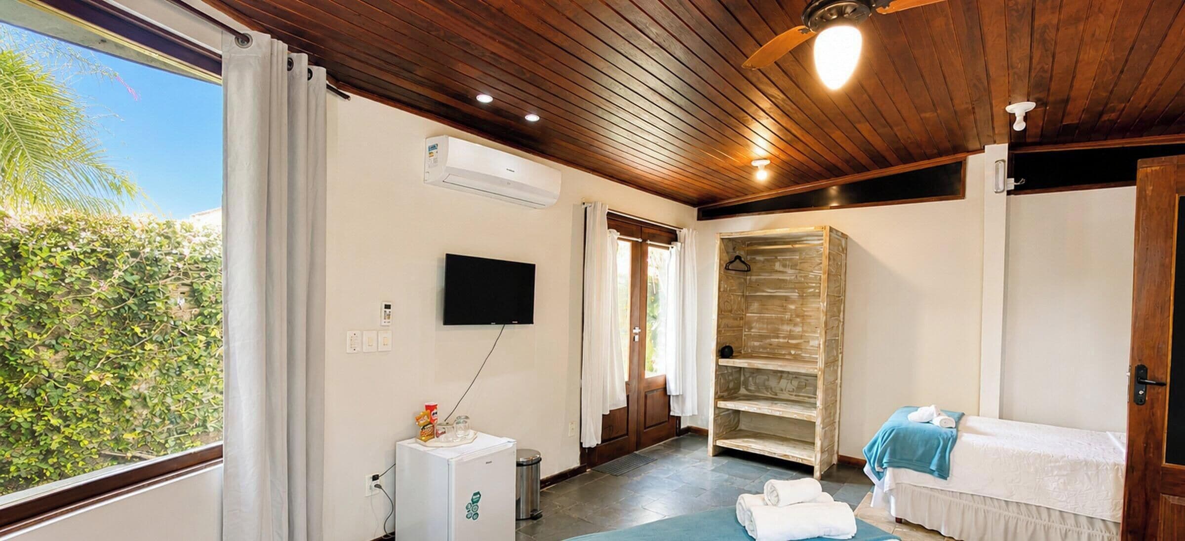 S3 - Suíte Lagoinha do Leste - Bollte Praia Boutique Pousada - Campeche | Sábanas de algodón egipcio, ropa de cama de alta calidad y minibar 