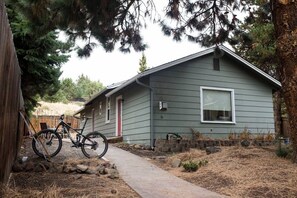 Welcome to this charming single-story home surrounded by a serene natural landscape.