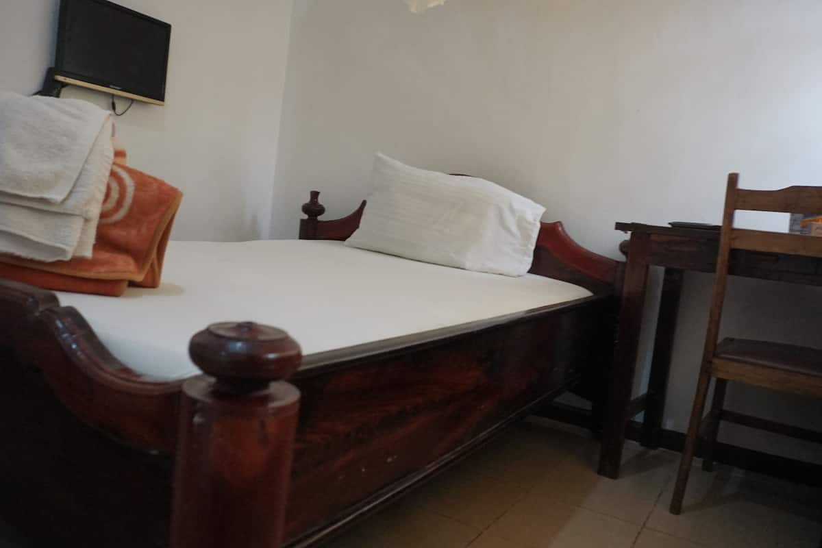 Chambre simple Confort, 1 chambre | AccĂšs au Wi-Fi (inclus)