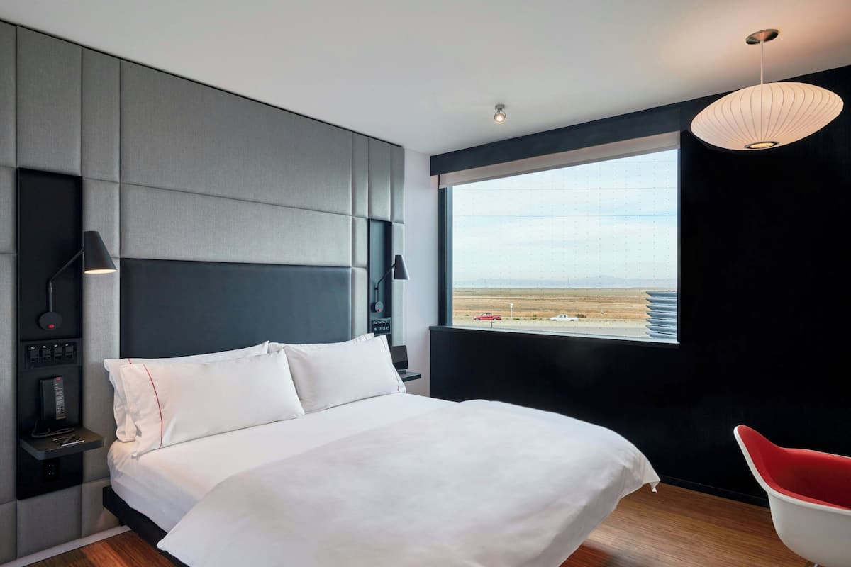 Room, 1 King Bed (Mobility Accessible, Roll-In Shower) | Premium bedding, down duvets, pillow-top beds, in-room safe