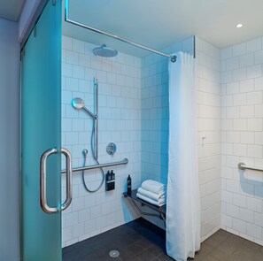 Room, 1 King Bed (Mobility Accessible, Roll-In Shower) | Bathroom | Shower, hydromassage showerhead, eco-friendly toiletries, hair dryer