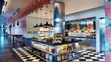 Daily buffet breakfast (USD 22 per person)