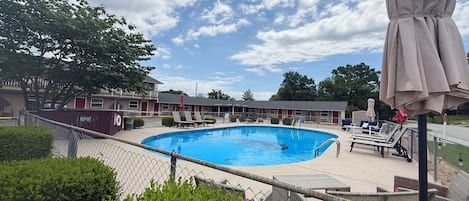 Seasonal outdoor pool, pool loungers