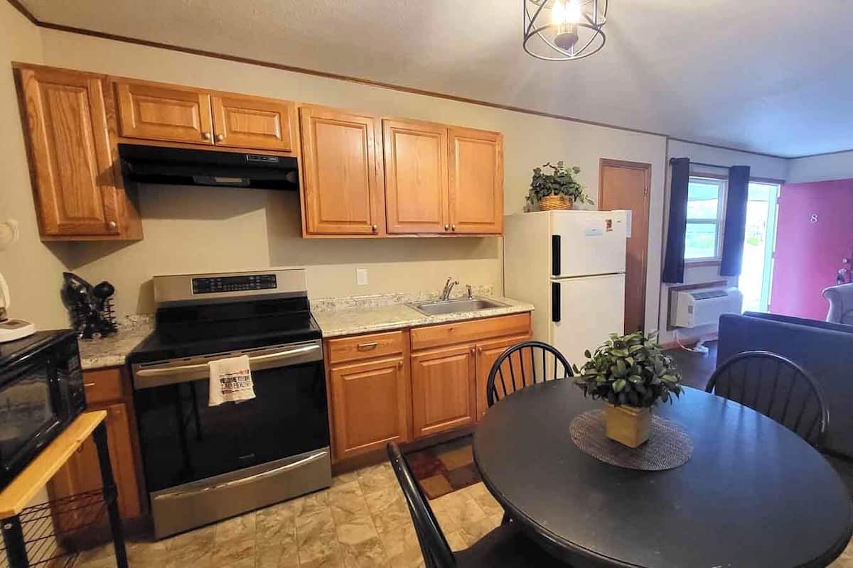 Room #8 | Pillowtop beds, blackout drapes, free WiFi, bed sheets