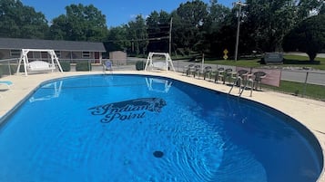 Seasonal outdoor pool, pool loungers