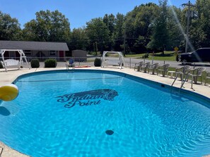 Seasonal outdoor pool, pool loungers