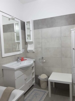 Hair dryer, bidet, towels, soap