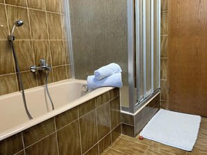 Hair dryer, towels, soap, toilet paper