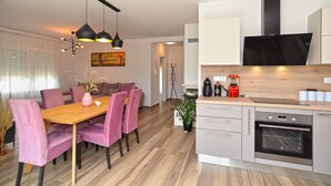 A modern kitchen with a built-in oven, a coffee maker, and a toaster. - House 2279/75934 (Istria - Medulin), 350m from the beach (Medulin)