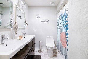 Hair dryer, towels, soap, shampoo