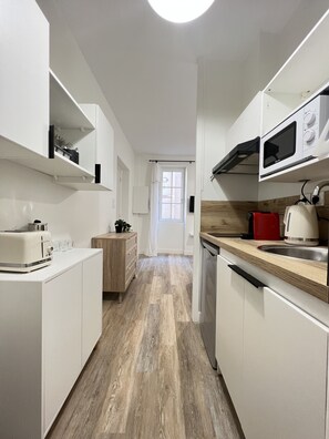 Fridge, microwave, coffee/tea maker, electric kettle