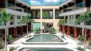 2 outdoor pools, open 10:00 AM to 10:00 PM, pool loungers