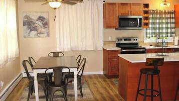 Microwave, dishwasher, coffee/tea maker, cookware/dishes/utensils